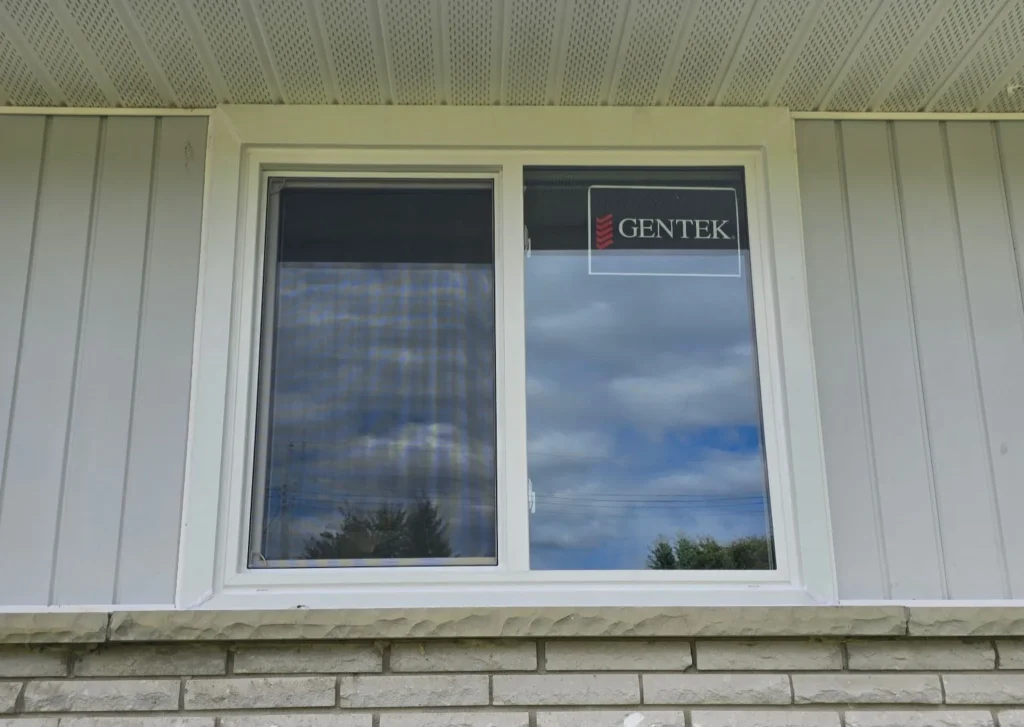Finished replacement window with clean exterior trim on a Sudbury home